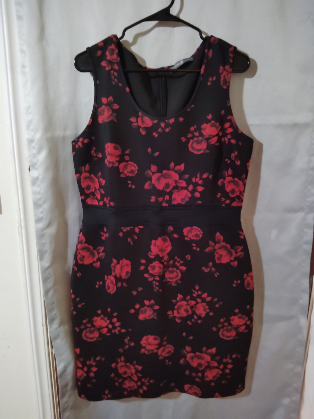 Sleeveless Black Dress with Red Floral Pattern